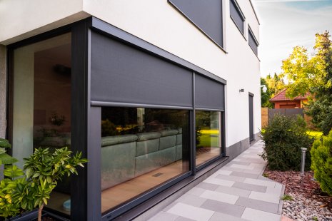 Minimalist screen decorates, shades, and allows light to pass through